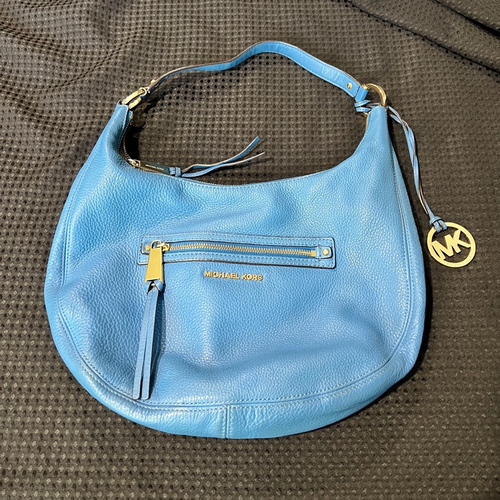 Michael Kors over the shoulder bag. Blue Bag with gold zipper.